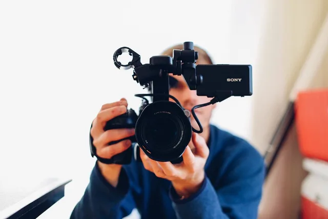 technology, gadgets, videography, sony, video, recorder, camcorder, guy, man, male, hold, still, videography, videography, videography, videography, videography. Short form video advertising rules without the guesswork